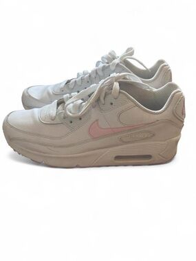 Nike Girl’s White Sneakers with Pink Swoosh Accent